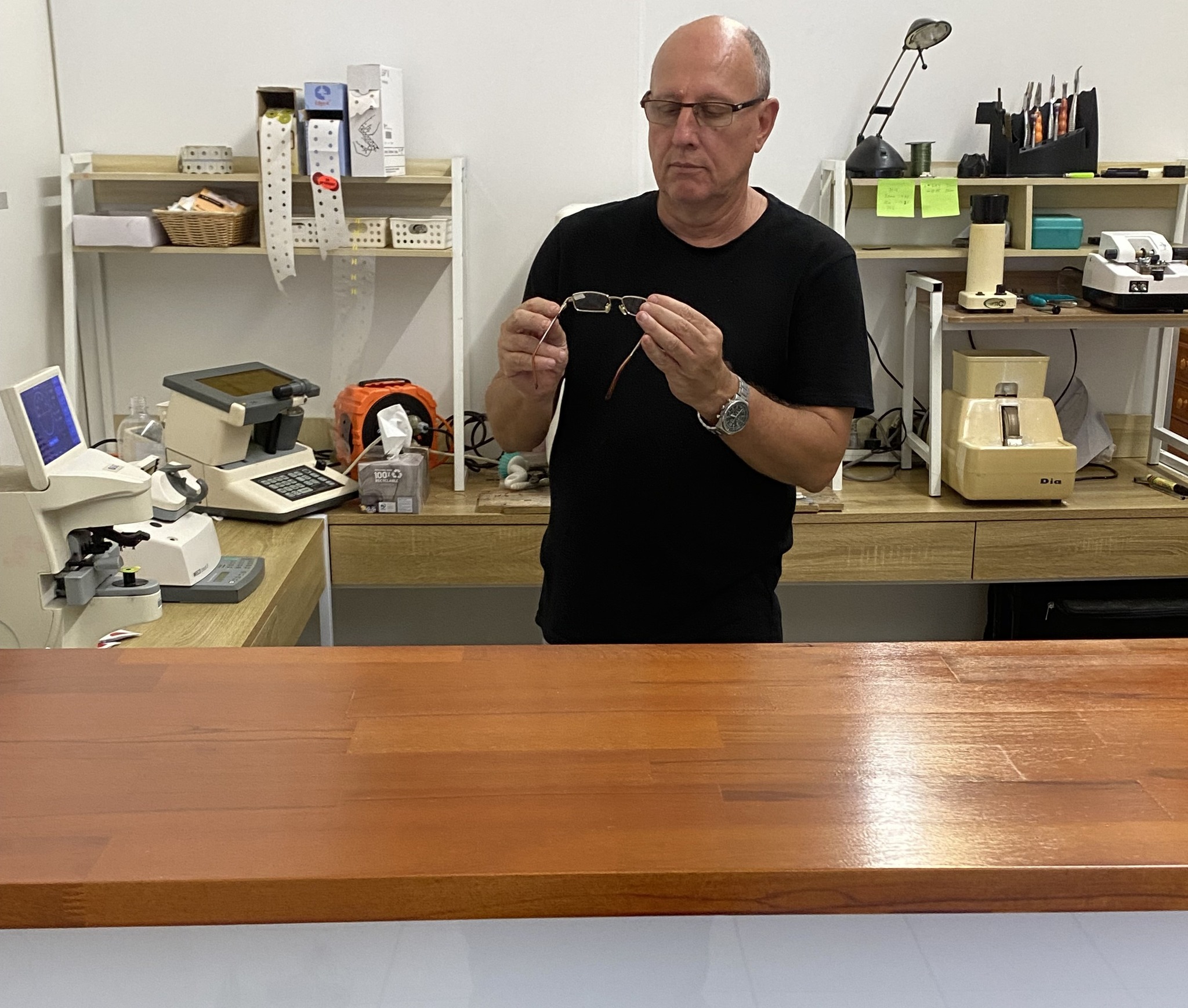 Gene in his optical fitting laboratory in Innisfail, North Queensland, Australia